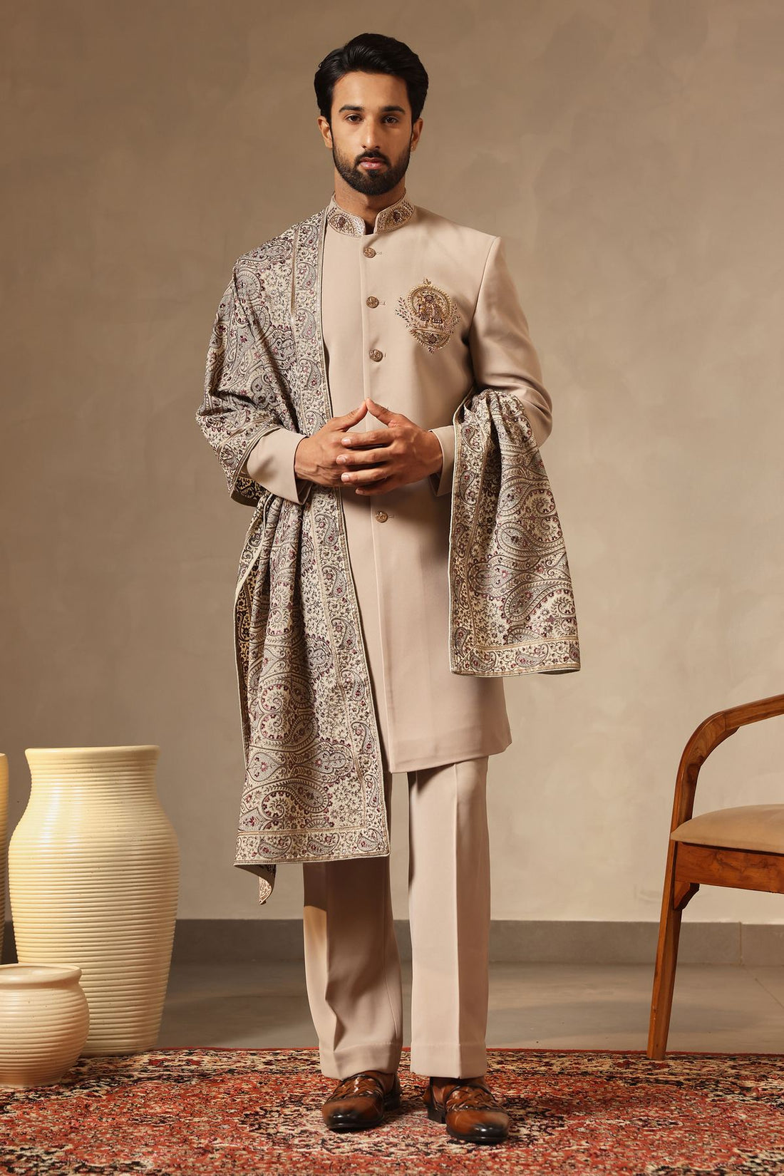 Fawn Beige Embroidered Sherwani Set with Statement Crest Motif, Heavy Embroidered Dupatta & Bootcut Pants